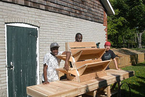 Student carpenters with cart at stable side door(001)(001)